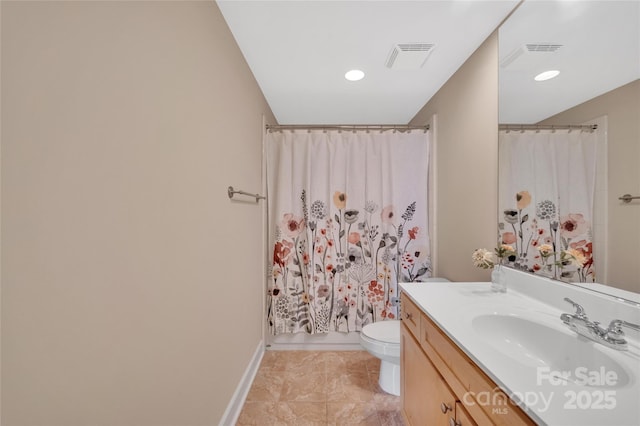 full bath featuring toilet, vanity, curtained shower, tile patterned floors, and baseboards