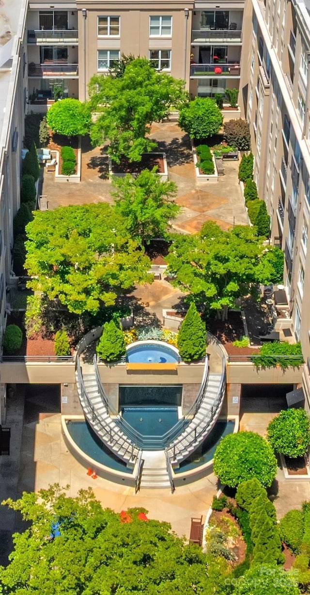 balcony featuring view of pool area