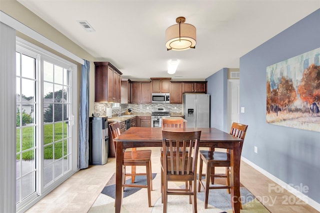 12217 Dearview Ln, Charlotte, NC 28269 - dining space with baseboards