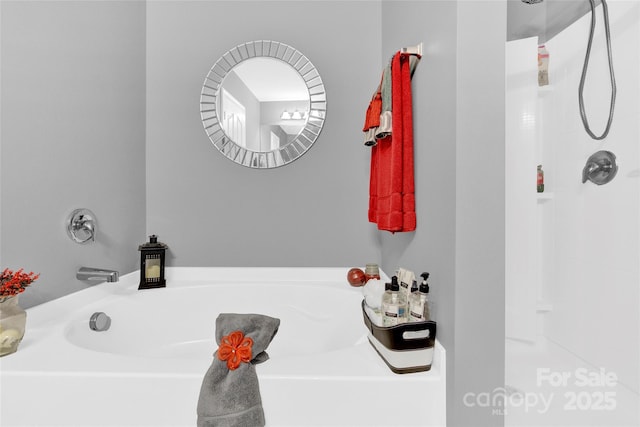 12217 Dearview Ln, Charlotte, NC 28269 - bathroom featuring a garden tub and a shower