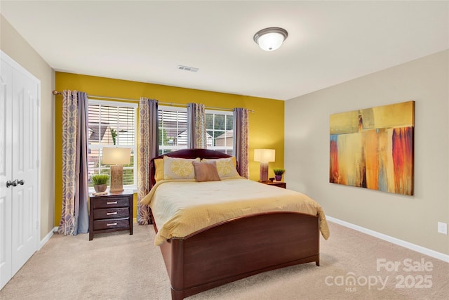 12217 Dearview Ln, Charlotte, NC 28269 - bedroom with light colored carpet and baseboards