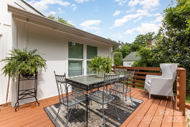 6824 Cortez Trl, Charlotte, NC 28227 - wooden terrace with outdoor dining area