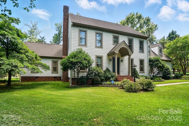 1295 Patterson St, China Grove, NC 28023 - view of front of property featuring a chimney, a front yard, crawl space, and roof with shingles