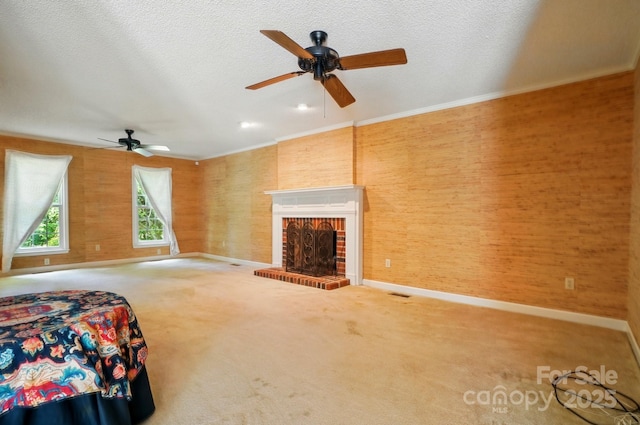 1295 Patterson St, China Grove, NC 28023 - unfurnished living room with a ceiling fan, baseboards, carpet, and a textured ceiling