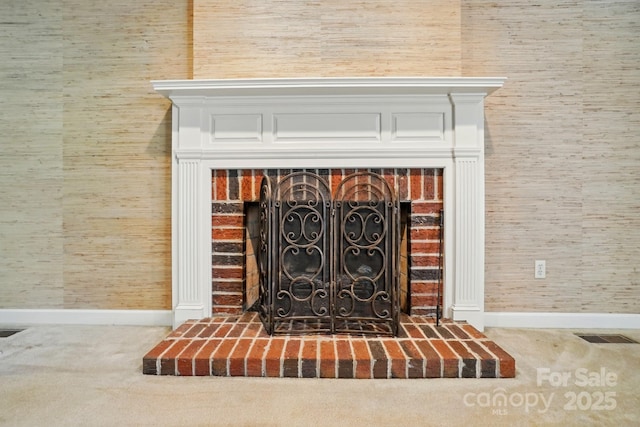 1295 Patterson St, China Grove, NC 28023 - detailed view of a fireplace, carpet flooring, and baseboards