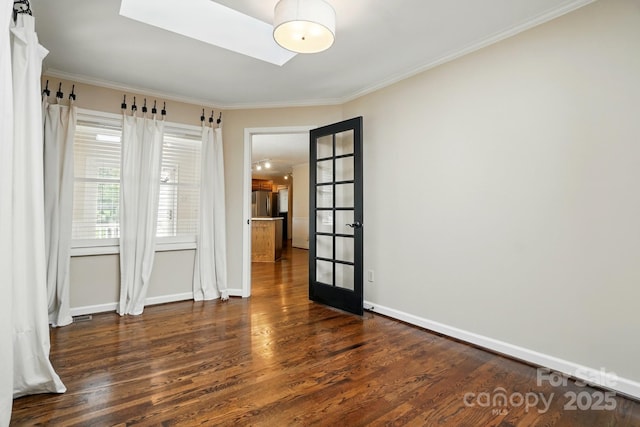 1295 Patterson St, China Grove, NC 28023 - empty room with wood finished floors, crown molding, and baseboards