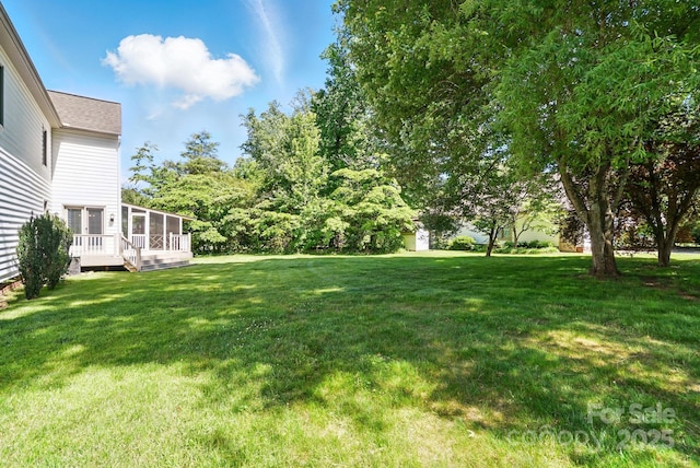 1295 Patterson St, China Grove, NC 28023 - view of green lawn with a sunroom