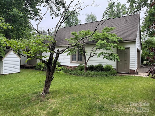 1295 Patterson St, China Grove, NC 28023 - view of side of home with roof with shingles and a yard