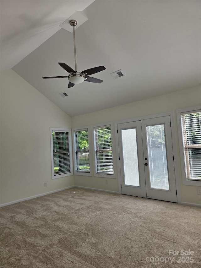 1111 Unionville Church Rd, Monroe, NC 28110 - spare room with carpet floors, french doors, ceiling fan, baseboards, and high vaulted ceiling