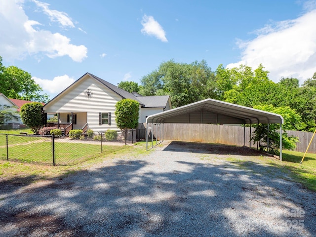 1111 Unionville Church Rd, Monroe, NC 28110 - view of front facade with a detached carport, driveway, and covered porch