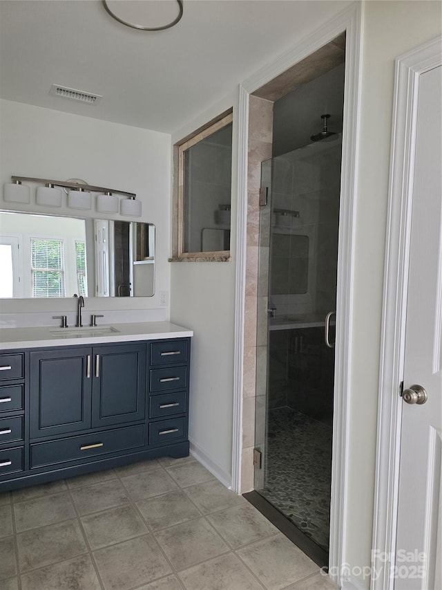 1111 Unionville Church Rd, Monroe, NC 28110 - bathroom featuring a shower stall, vanity, and tile patterned flooring