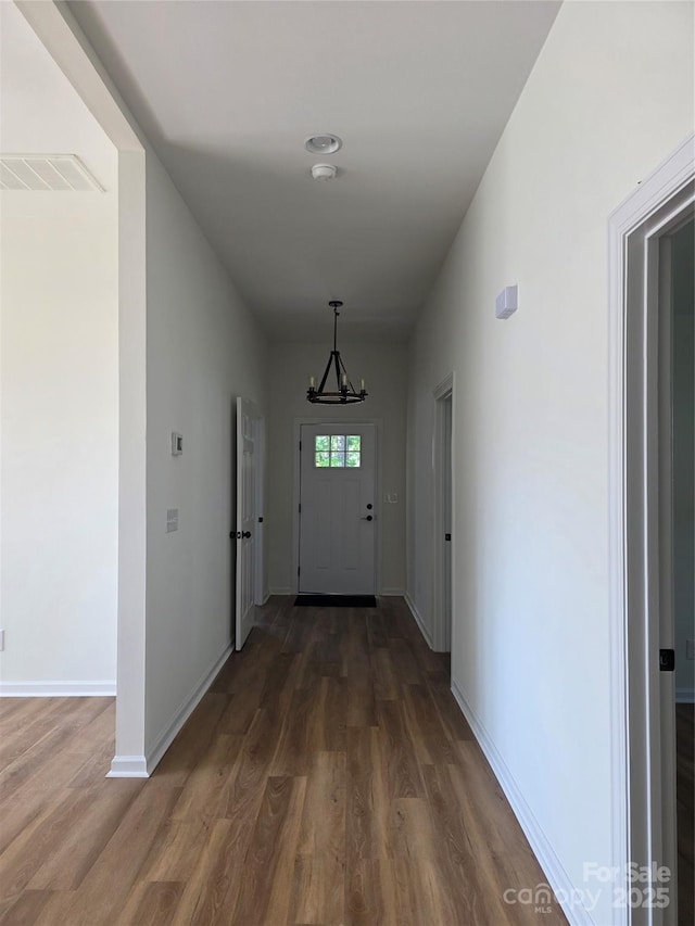 1111 Unionville Church Rd, Monroe, NC 28110 - doorway to outside featuring wood finished floors and baseboards