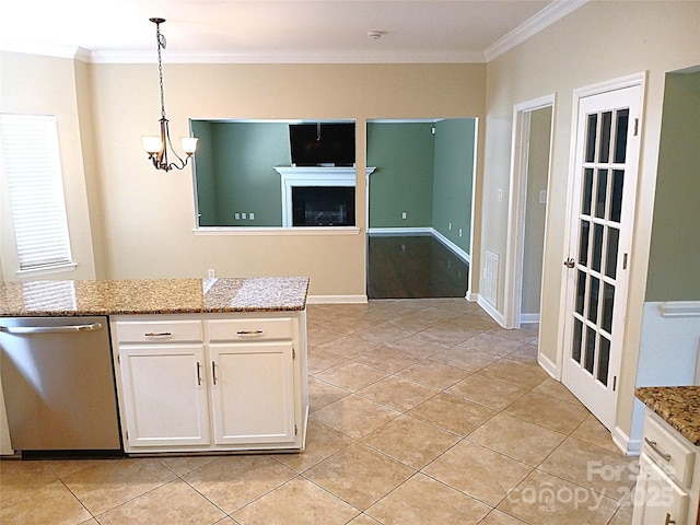 12304 Sandringham Pl, Charlotte, NC 28262 - kitchen with stainless steel dishwasher, crown molding, white cabinetry, hanging light fixtures, and light tile patterned floors