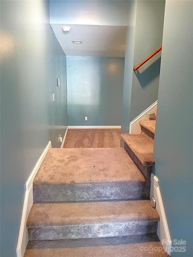 12304 Sandringham Pl, Charlotte, NC 28262 - stairway with carpet flooring and baseboards