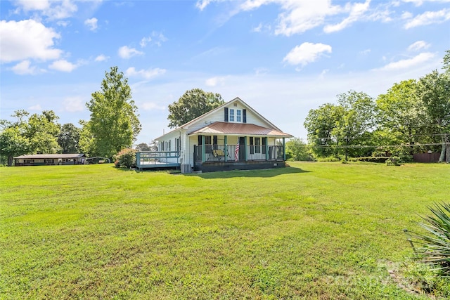 35 Telephone Exchange Rd, Hickory, NC 28601 - view of front facade with a front lawn, central air condition unit, and metal roof