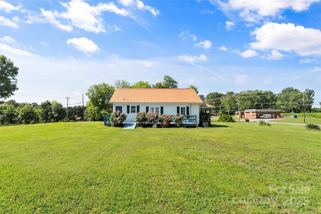35 Telephone Exchange Rd, Hickory, NC 28601 - back of house with a lawn, metal roof, and a deck