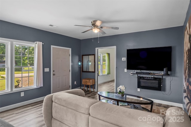 35 Telephone Exchange Rd, Hickory, NC 28601 - living room with wood finished floors, ceiling fan, and baseboards