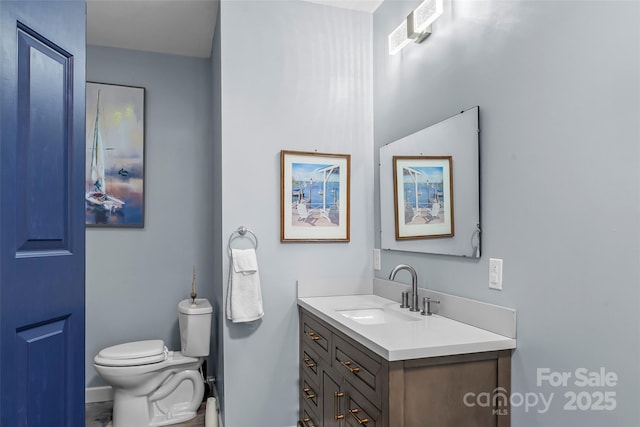 35 Telephone Exchange Rd, Hickory, NC 28601 - half bathroom featuring vanity, toilet, and baseboards