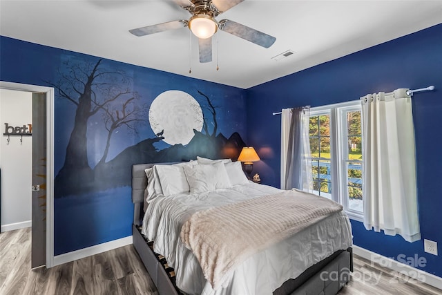 35 Telephone Exchange Rd, Hickory, NC 28601 - bedroom with baseboards, wood finished floors, and ceiling fan