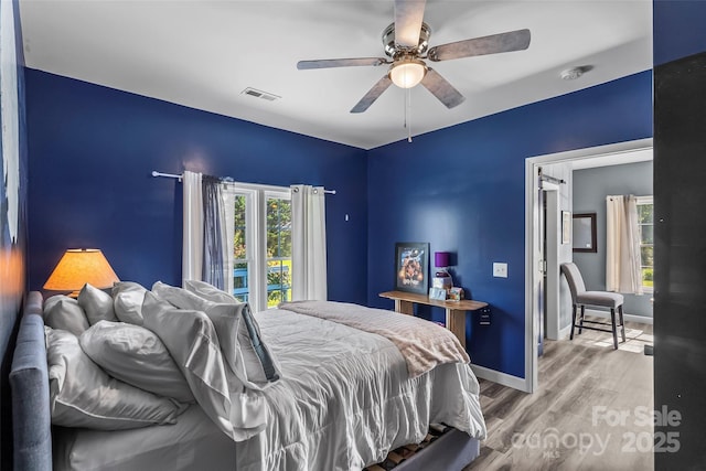 35 Telephone Exchange Rd, Hickory, NC 28601 - bedroom with wood finished floors, baseboards, and ceiling fan
