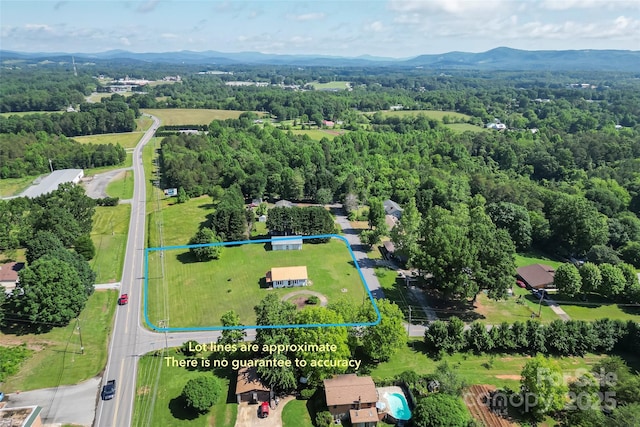 35 Telephone Exchange Rd, Hickory, NC 28601 - aerial view of property's location featuring property boundaries highlighted, a mountainous background, and a forest