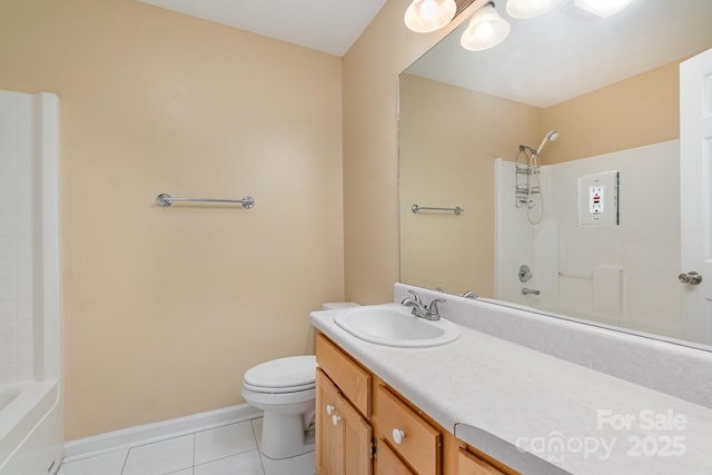 bathroom with tile patterned flooring, tub / shower combination, toilet, vanity, and baseboards