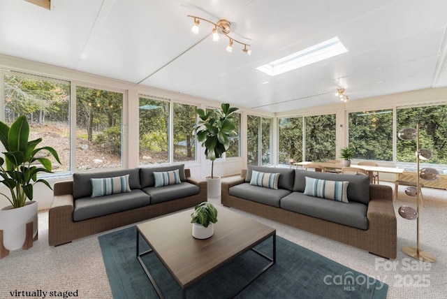 30 Robin Ln, Asheville, NC 28806 - sunroom / solarium with a skylight, plenty of natural light, carpet floors, and lofted ceiling