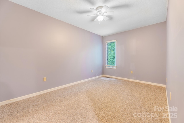 30 Robin Ln, Asheville, NC 28806 - carpeted empty room with a ceiling fan, baseboards, and a textured ceiling