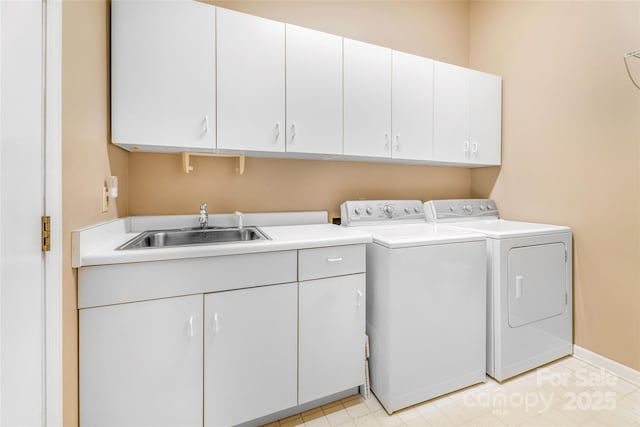 30 Robin Ln, Asheville, NC 28806 - washroom featuring cabinet space, washer and clothes dryer, and baseboards