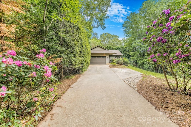 30 Robin Ln, Asheville, NC 28806 - view of front of home featuring driveway and a garage