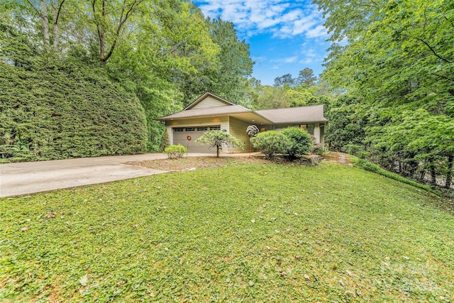 30 Robin Ln, Asheville, NC 28806 - view of front of house featuring driveway, a front yard, and a garage