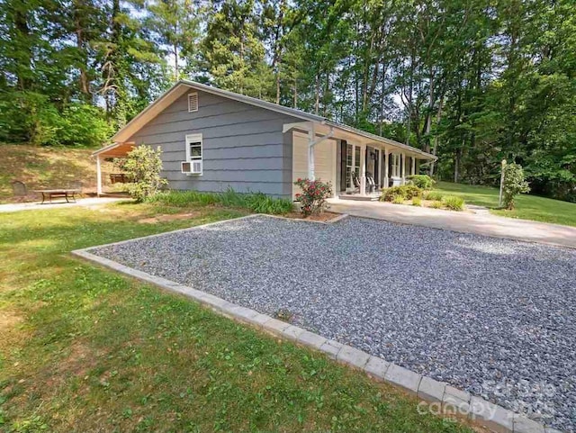 150 Deerwoode Ln, Brevard, NC 28712 - view of front of house with a front lawn and cooling unit