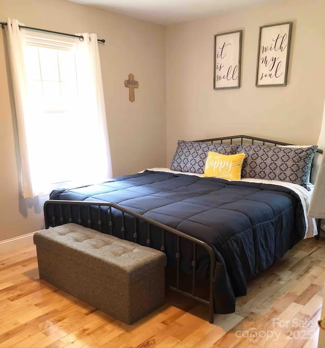 150 Deerwoode Ln, Brevard, NC 28712 - bedroom featuring light wood-type flooring