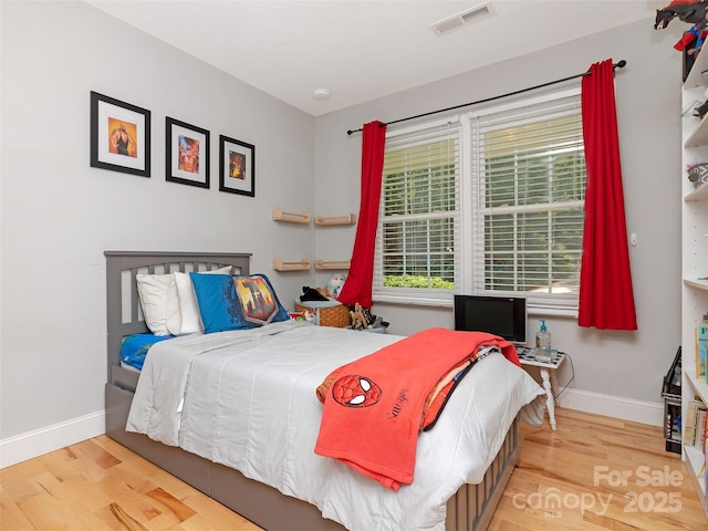 150 Deerwoode Ln, Brevard, NC 28712 - bedroom with wood finished floors and baseboards