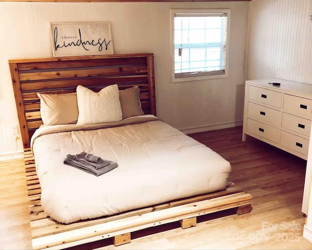 150 Deerwoode Ln, Brevard, NC 28712 - bedroom featuring wood finished floors and baseboards
