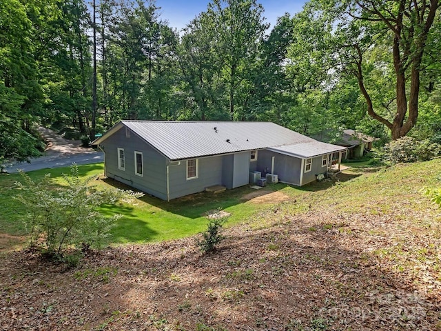 150 Deerwoode Ln, Brevard, NC 28712 - rear view of house with metal roof and a yard