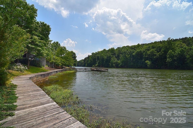108 Brit Ln, New London, NC 28127 - water view with a floating dock and a heavily wooded area