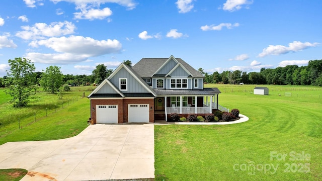 3707 Seagrave Farm Rd, Concord, NC 28025 - craftsman-style home featuring covered porch, driveway, board and batten siding, brick siding, and a garage