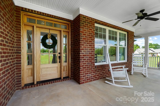 3707 Seagrave Farm Rd, Concord, NC 28025 - property entrance featuring covered porch, brick siding, and a ceiling fan