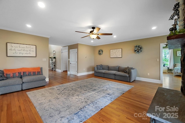 3707 Seagrave Farm Rd, Concord, NC 28025 - living room featuring ceiling fan, baseboards, wood finished floors, recessed lighting, and ornamental molding