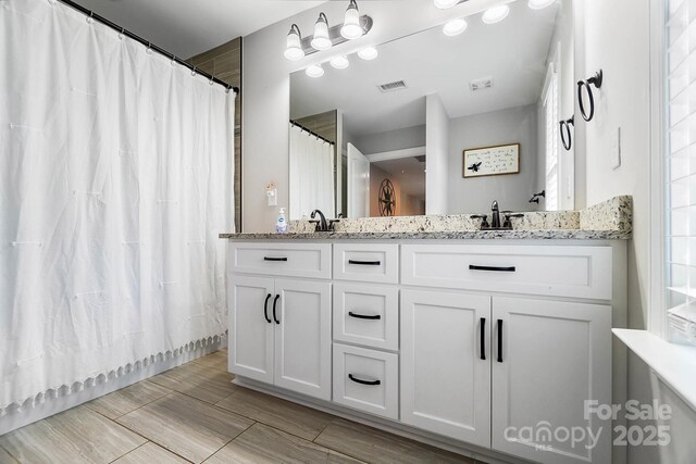 3707 Seagrave Farm Rd, Concord, NC 28025 - bathroom featuring double vanity and curtained shower