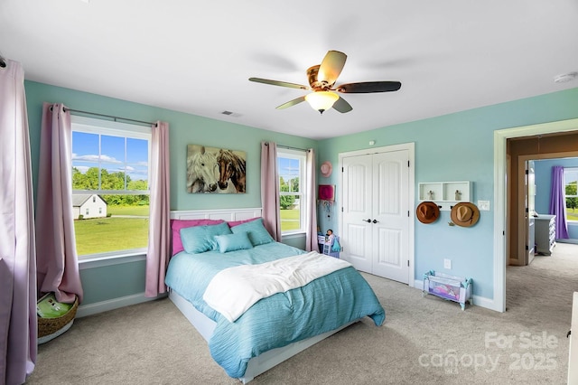 3707 Seagrave Farm Rd, Concord, NC 28025 - carpeted bedroom featuring a closet, baseboards, and ceiling fan