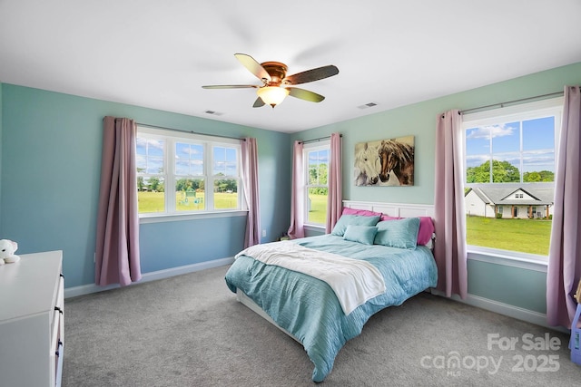 3707 Seagrave Farm Rd, Concord, NC 28025 - bedroom with light carpet, ceiling fan, and baseboards