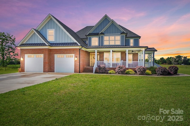 3707 Seagrave Farm Rd, Concord, NC 28025 - view of front facade featuring board and batten siding, concrete driveway, covered porch, a front yard, and brick siding