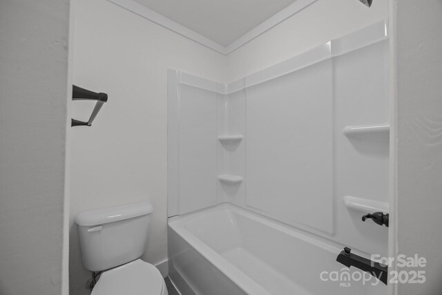 207 Eden St, Davidson, NC 28036 - bathroom featuring toilet and washtub / shower combination