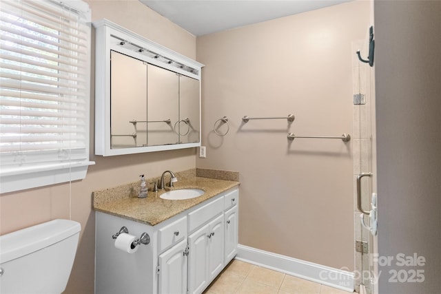 8024 Bradford Ln, Denver, NC 28037 - bathroom featuring plenty of natural light, vanity, toilet, and tile patterned floors