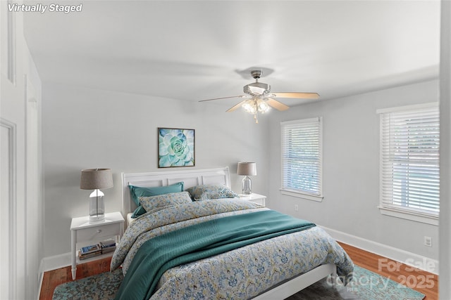 8024 Bradford Ln, Denver, NC 28037 - bedroom featuring baseboards, wood finished floors, and a ceiling fan