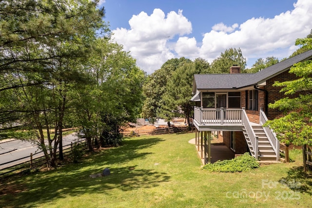 8024 Bradford Ln, Denver, NC 28037 - view of yard featuring stairway and a wooden deck