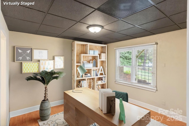 8024 Bradford Ln, Denver, NC 28037 - home office featuring a paneled ceiling, wood finished floors, and baseboards