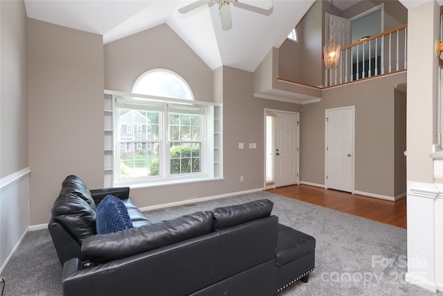 9315 Pebble Creek Way, Charlotte, NC 28269 - carpeted living area featuring high vaulted ceiling, a ceiling fan, and baseboards